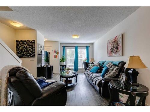 56 Auburn Bay Link Se, Calgary, AB - Indoor Photo Showing Living Room