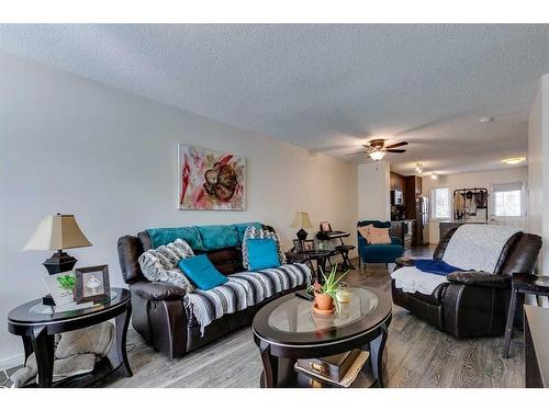 56 Auburn Bay Link Se, Calgary, AB - Indoor Photo Showing Living Room