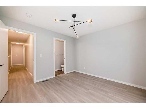 170 Copperleaf Way Se, Calgary, AB - Indoor Photo Showing Other Room