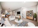 170 Copperleaf Way Se, Calgary, AB  - Indoor Photo Showing Living Room 