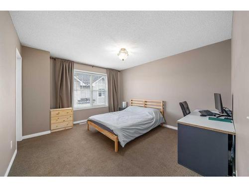 3302 New Brighton Gardens Se, Calgary, AB - Indoor Photo Showing Bedroom