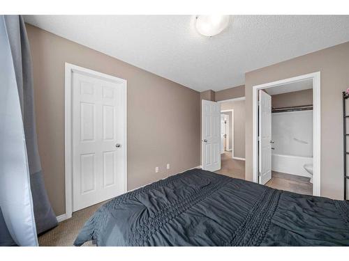 3302 New Brighton Gardens Se, Calgary, AB - Indoor Photo Showing Bedroom