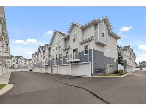 3302 New Brighton Gardens Se, Calgary, AB - Outdoor With Facade