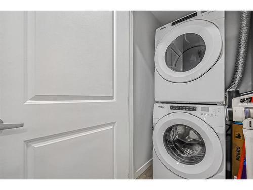 3202-3727 Sagehill Drive Nw, Calgary, AB - Indoor Photo Showing Laundry Room