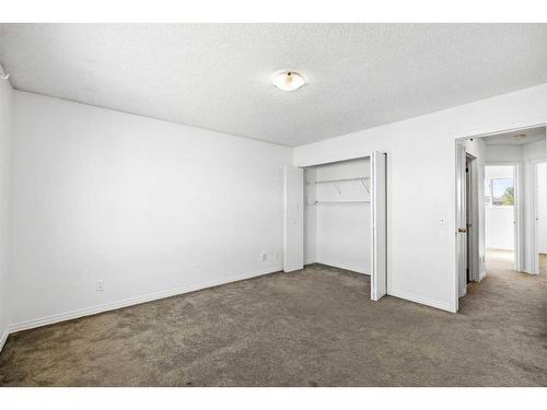 210 Saratoga Close Ne, Calgary, AB - Indoor Photo Showing Other Room