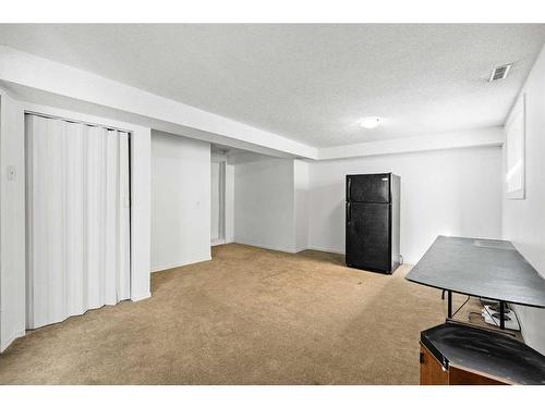 210 Saratoga Close Ne, Calgary, AB - Indoor Photo Showing Other Room