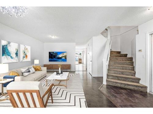 210 Saratoga Close Ne, Calgary, AB - Indoor Photo Showing Living Room