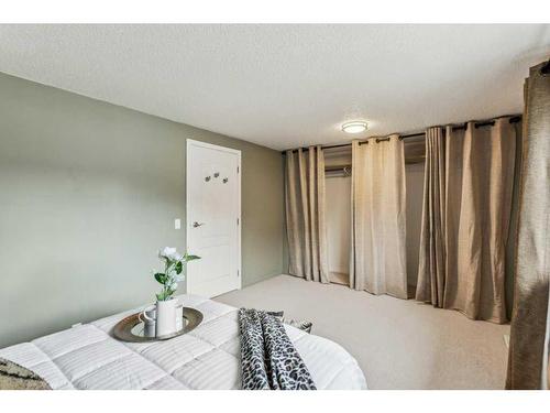 637 Queensland Place Se, Calgary, AB - Indoor Photo Showing Bedroom