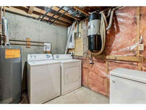 637 Queensland Place Se, Calgary, AB - Indoor Photo Showing Laundry Room