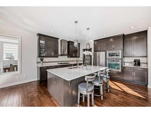 25 Aspen Summit Manor Sw, Calgary, AB - Indoor Photo Showing Kitchen With Upgraded Kitchen