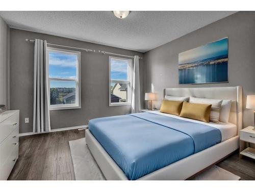 808 Prairie Sound Circle Nw, High River, AB - Indoor Photo Showing Bedroom