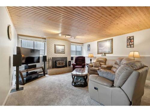 364 Silvergrove Place Nw, Calgary, AB - Indoor Photo Showing Living Room With Fireplace