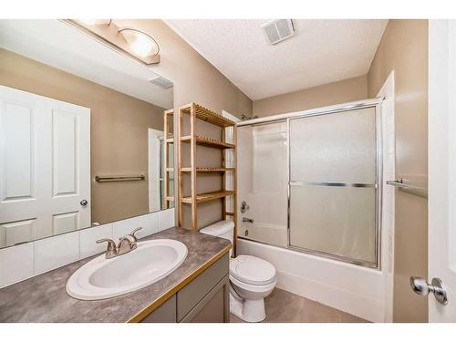 53 Eversyde Court Sw, Calgary, AB - Indoor Photo Showing Bathroom