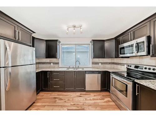 10816 Shamrock Place Sw, Calgary, AB - Indoor Photo Showing Kitchen With Upgraded Kitchen