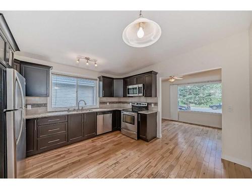 10816 Shamrock Place Sw, Calgary, AB - Indoor Photo Showing Kitchen