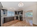 10816 Shamrock Place Sw, Calgary, AB  - Indoor Photo Showing Kitchen 