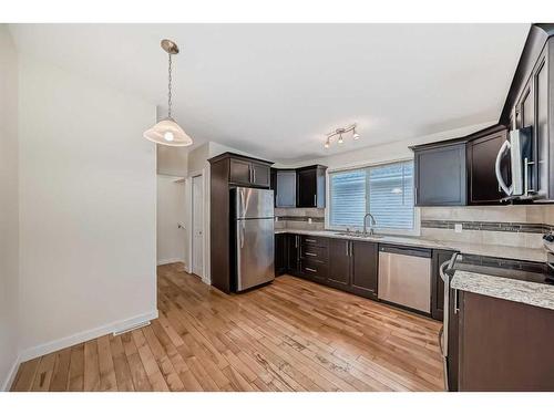 10816 Shamrock Place Sw, Calgary, AB - Indoor Photo Showing Kitchen