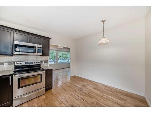 10816 Shamrock Place Sw, Calgary, AB - Indoor Photo Showing Kitchen