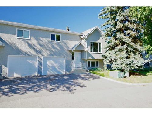 117 Fairway View Nw, High River, AB - Outdoor With Facade