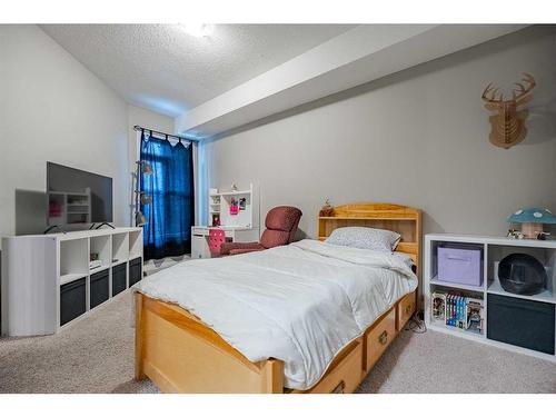 109-15304 Bannister Road Se, Calgary, AB - Indoor Photo Showing Bedroom