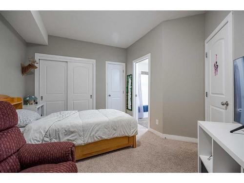 109-15304 Bannister Road Se, Calgary, AB - Indoor Photo Showing Bedroom