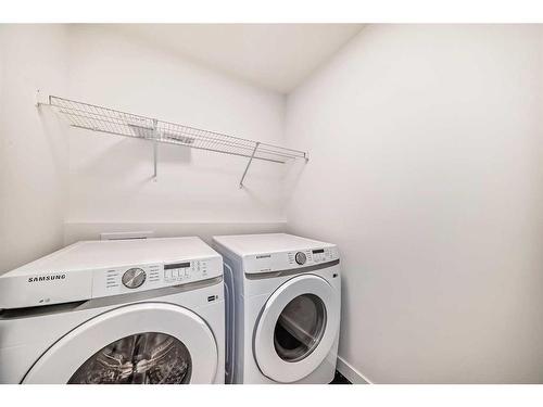 41 Cobbleridge Place, Airdrie, AB - Indoor Photo Showing Laundry Room