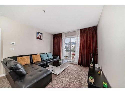 1215-333 Taravista Drive Ne, Calgary, AB - Indoor Photo Showing Living Room