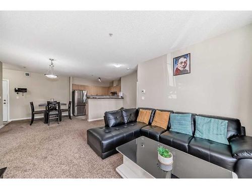 1215-333 Taravista Drive Ne, Calgary, AB - Indoor Photo Showing Living Room