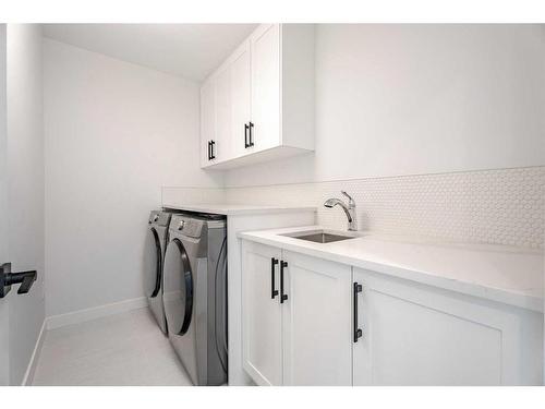 3209 16 Street Sw, Calgary, AB - Indoor Photo Showing Laundry Room