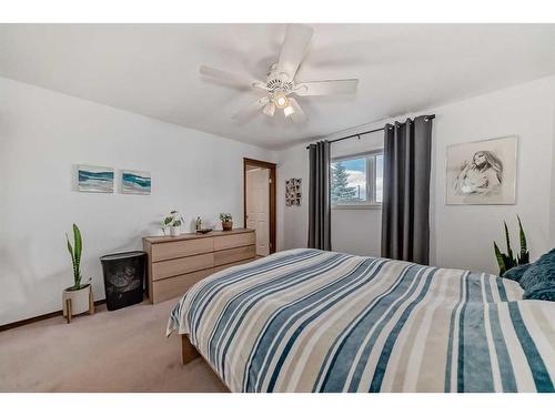 108 High Ridge Place Nw, High River, AB - Indoor Photo Showing Bedroom