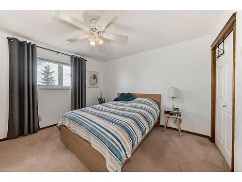 108 High Ridge Place Nw, High River, AB - Indoor Photo Showing Bedroom