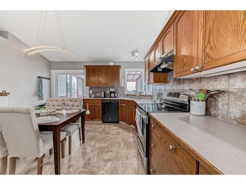 108 High Ridge Place Nw, High River, AB - Indoor Photo Showing Kitchen