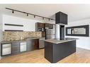 304-2137 16 Street Sw, Calgary, AB  - Indoor Photo Showing Kitchen With Stainless Steel Kitchen With Double Sink 