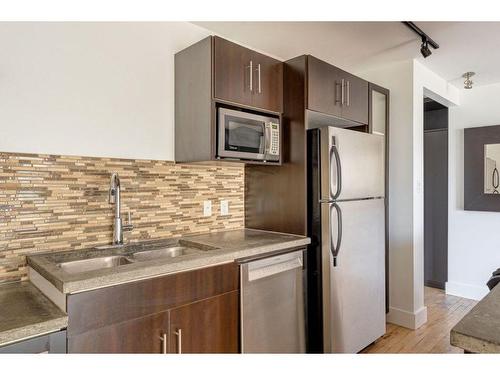 304-2137 16 Street Sw, Calgary, AB - Indoor Photo Showing Kitchen With Double Sink