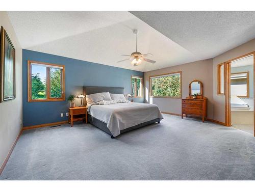 25 Patterson Park Sw, Calgary, AB - Indoor Photo Showing Bedroom