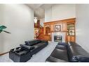 25 Patterson Park Sw, Calgary, AB  - Indoor Photo Showing Living Room With Fireplace 