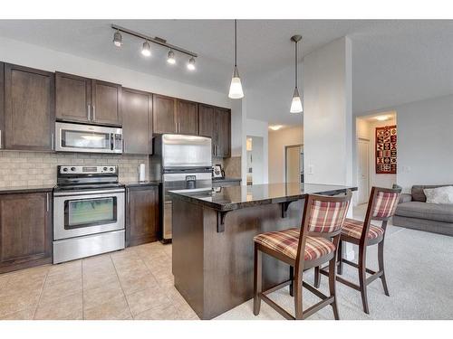 206-88 Arbour Lake Road Nw, Calgary, AB - Indoor Photo Showing Kitchen With Stainless Steel Kitchen With Upgraded Kitchen