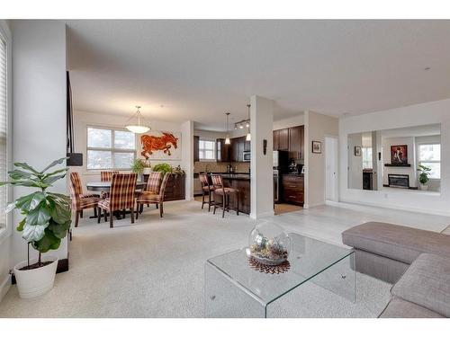 206-88 Arbour Lake Road Nw, Calgary, AB - Indoor Photo Showing Living Room