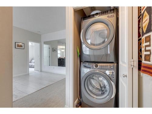 206-88 Arbour Lake Road Nw, Calgary, AB - Indoor Photo Showing Laundry Room