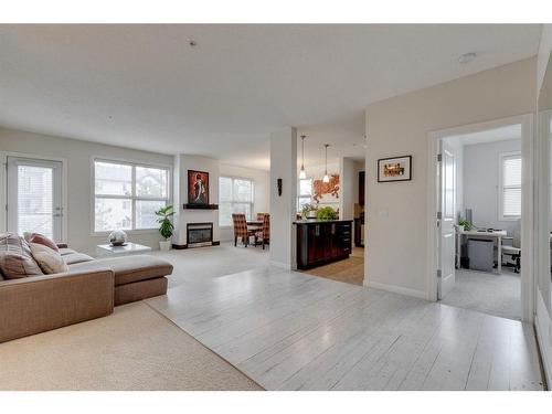 206-88 Arbour Lake Road Nw, Calgary, AB - Indoor Photo Showing Living Room