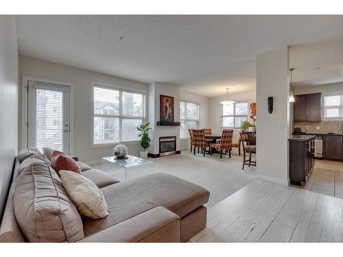 206-88 Arbour Lake Road Nw, Calgary, AB - Indoor Photo Showing Living Room