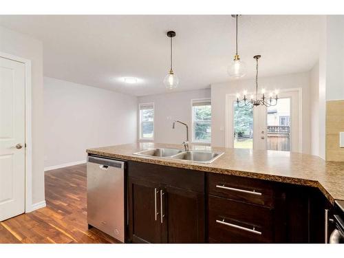 803-2384 Sagewood Gate Sw, Airdrie, AB - Indoor Photo Showing Kitchen With Double Sink