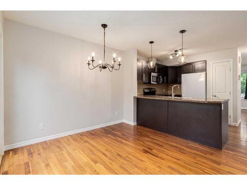 803-2384 Sagewood Gate Sw, Airdrie, AB - Indoor Photo Showing Kitchen