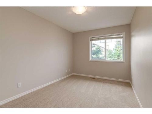 803-2384 Sagewood Gate Sw, Airdrie, AB - Indoor Photo Showing Other Room