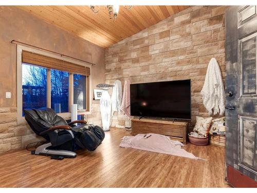 370120 176 Street West, Rural Foothills County, AB - Indoor Photo Showing Living Room With Fireplace