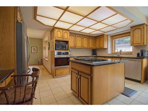 319 Edenwold Drive Nw, Calgary, AB - Indoor Photo Showing Kitchen With Stainless Steel Kitchen