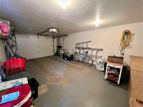 126 4 Avenue Se, High River, AB - Indoor Photo Showing Garage