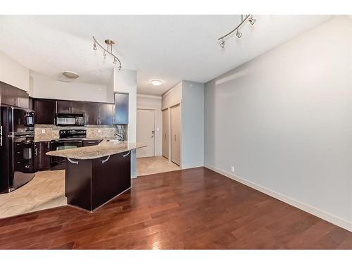 1607-8710 Horton Road Sw, Calgary, AB - Indoor Photo Showing Kitchen