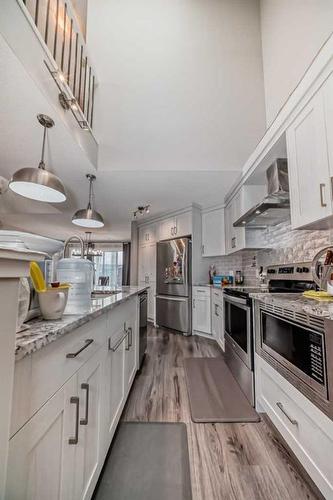 14680 1 Street Ne, Calgary, AB - Indoor Photo Showing Kitchen With Stainless Steel Kitchen With Upgraded Kitchen