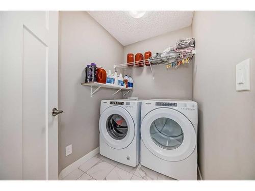 14680 1 Street Ne, Calgary, AB - Indoor Photo Showing Laundry Room